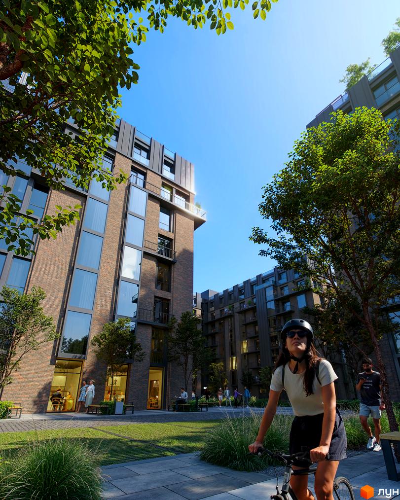 Житловий комплекс Центр: цегляні фасади, панорамні вікна та зелена прибудинкова територія з місцями для відпочинку. Сучасна архітектура та комфортне життя.