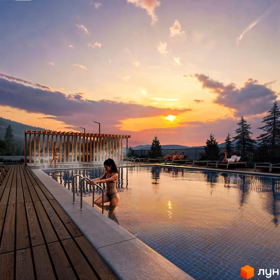 Апарт-комплекс Меланіт Резорт & СПА з басейном та відпочиваючими на заході сонця. Навколо комплексу ліс та гори.