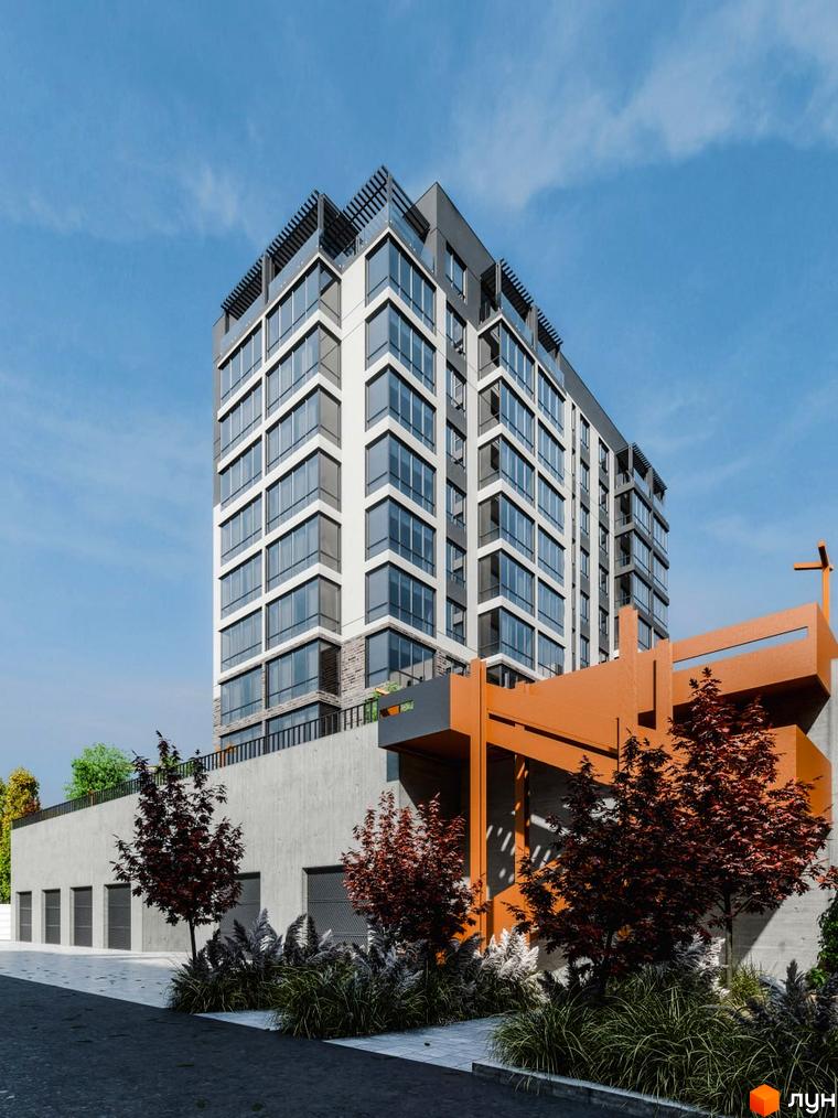 Фасад житлового комплексу Перемога з великою кількістю вікон та терасами. Прибудинкова територія з деревами та декоративними рослинами.