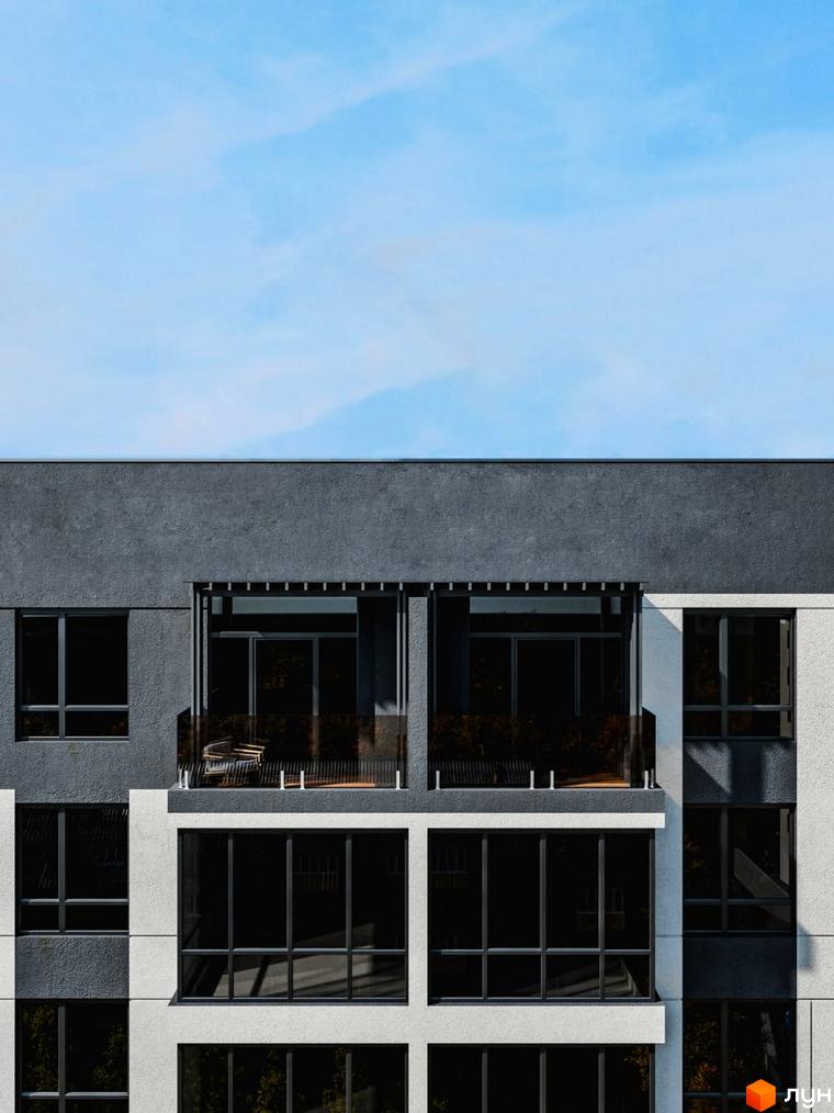 Фасад житлового комплексу Перемога з великими вікнами та балконами. Зовнішній вигляд будинку з сірим та білим оздобленням.