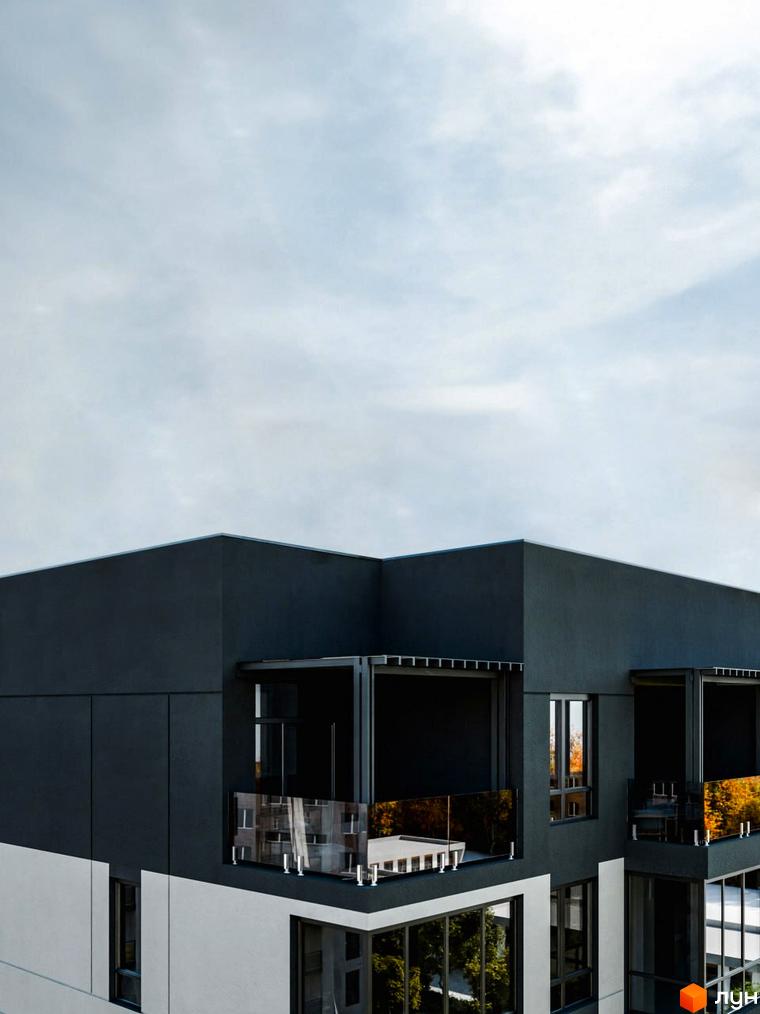 Новобудова ЖК Перемога з темним фасадом та скляними балконами. Навколо видно дерева.