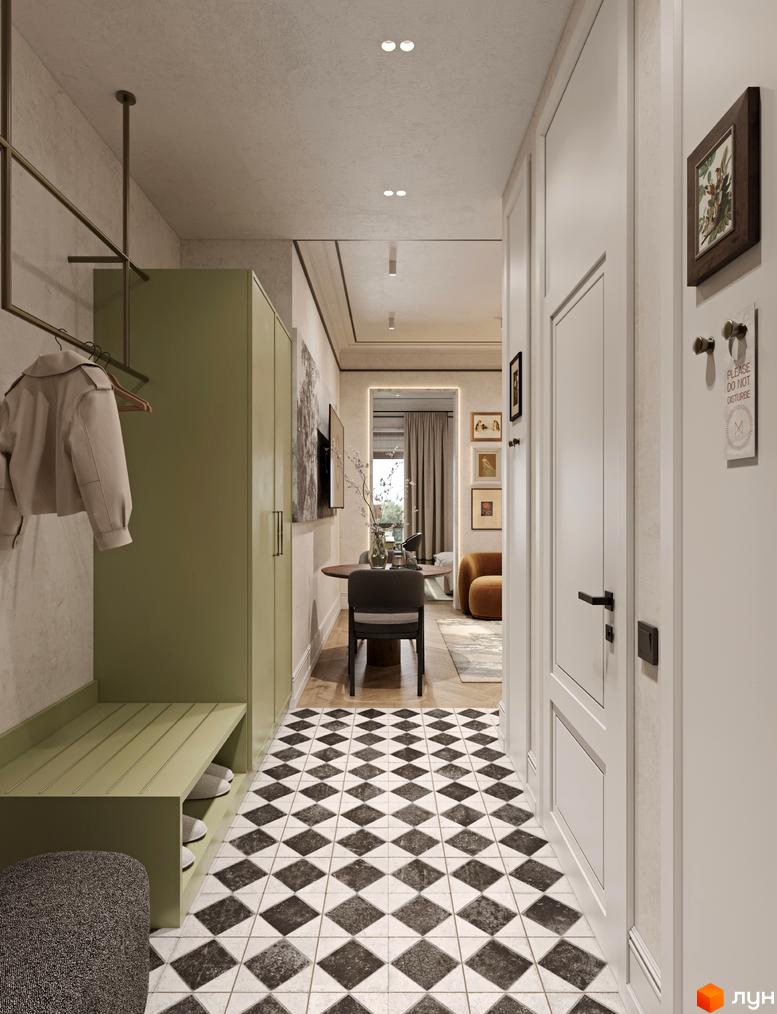 Апарт-готель Apex: передпокій з зеленою шафою, лавкою для взуття та плиткою на підлозі. Далі видно частину вітальні з круглим столом та кріслом.