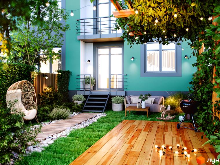 Житловий комплекс Амстердам Клубний: зелена фасадна стіна, балкон, тераса з вуличними гірляндами, зона барбекю та зона відпочинку.