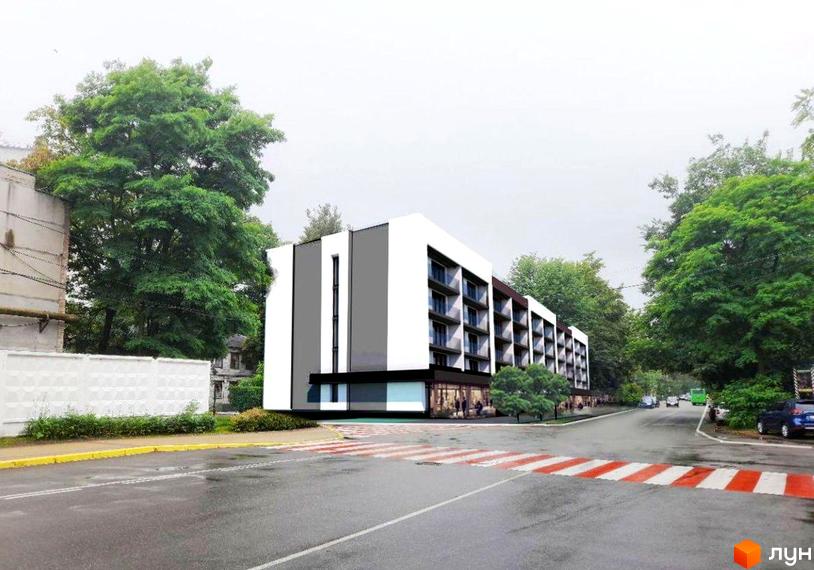 Новобудова ЖК Nord-Wood з фасадом з білих та сірих панелей, балконами та комерційними приміщеннями на першому поверсі. Поруч дорога з пішохідним переходом та зелені насадження.