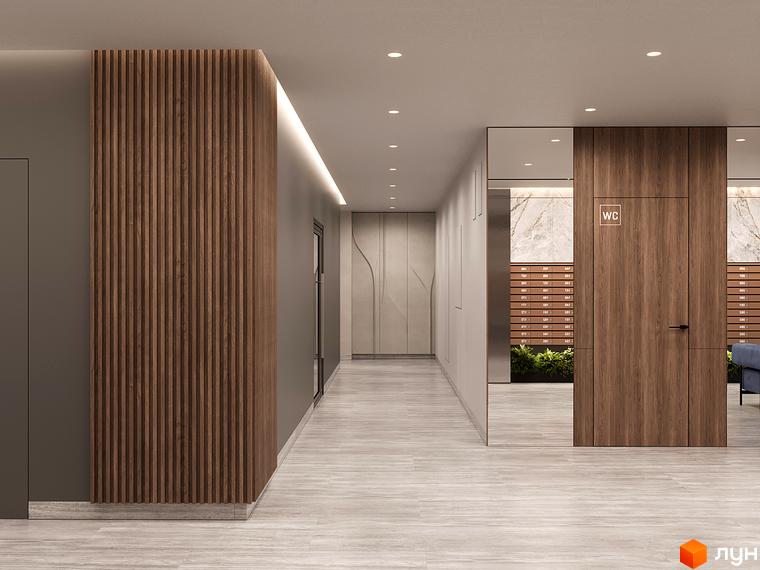 Інтер'єр холу житлового комплексу Polar Park з дерев'яними панелями та дверима. Сучасний дизайн вхідної групи новобудови.