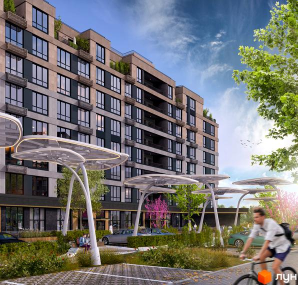 Житловий комплекс RIVERVILLE з елегантною фасадною частиною та зеленою прибудинковою територією з місцями для відпочинку та паркування.