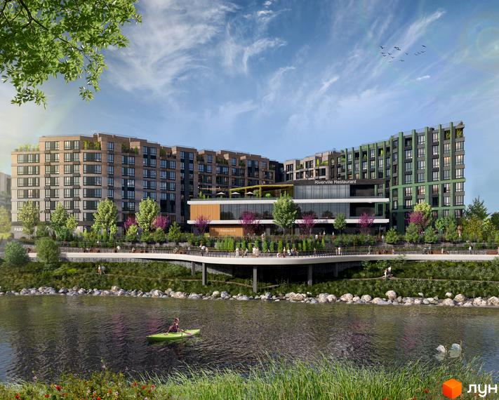 Житловий комплекс RIVERVILLE з фасадами різних кольорів та зеленою прибудинковою територією біля річки. Набережна з пішохідною зоною та місцями для відпочинку.