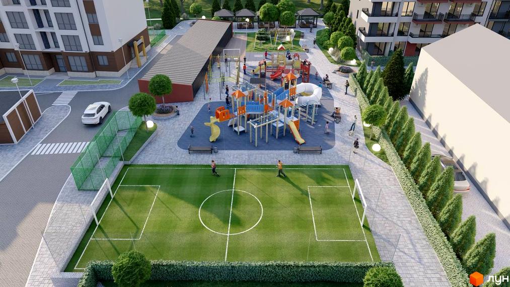 Житловий комплекс Затишний квартал з дитячим майданчиком та футбольним полем. Сучасна архітектура будинків та доглянута прибудинкова територія.