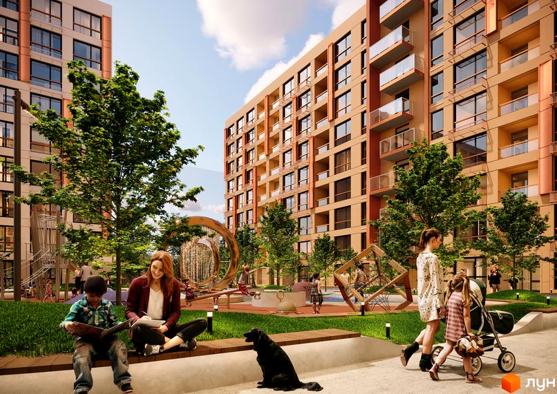 Житловий комплекс Estet Hill з фасадами бежевого та мідного кольорів та дитячим майданчиком на прибудинковій території.