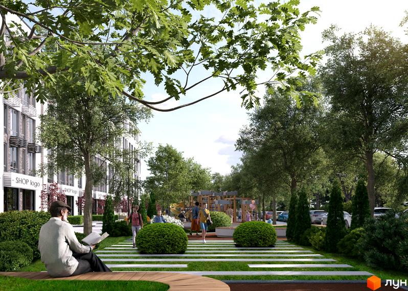 Житловий комплекс Parkway House з фасадами з білої цегли та сірих панелей, зеленою прибудинковою територією та дитячим майданчиком.