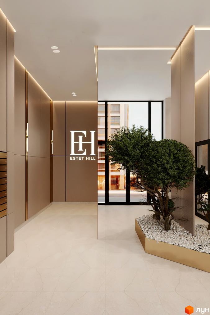 Інтер'єр холу житлового комплексу Estet Hill з рослинами та елегантним освітленням. Сучасний дизайн вхідної групи новобудови.