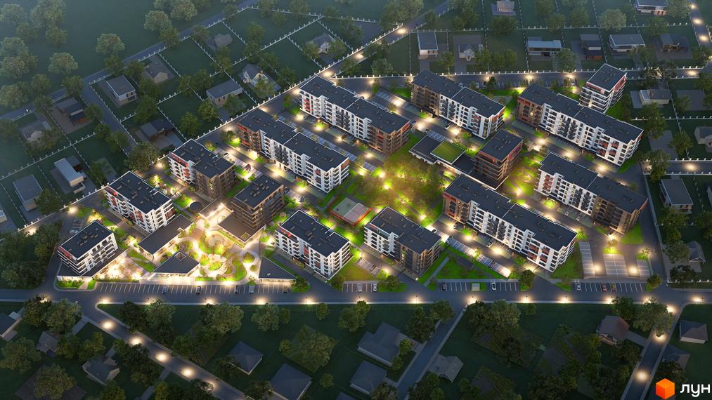 Зображення Житлового комплексу AURA Resident з виглядом на багатоповерхові будинки та прибудинкову територію з освітленням.