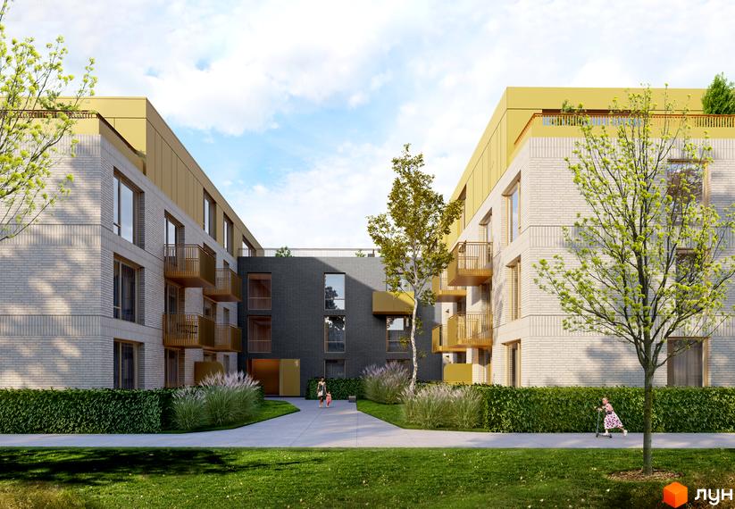 Зображення Житлового комплексу Woodside з фасадом з білої цегли та золотими вставками. На передньому плані зелений газон та пішохідна доріжка.
