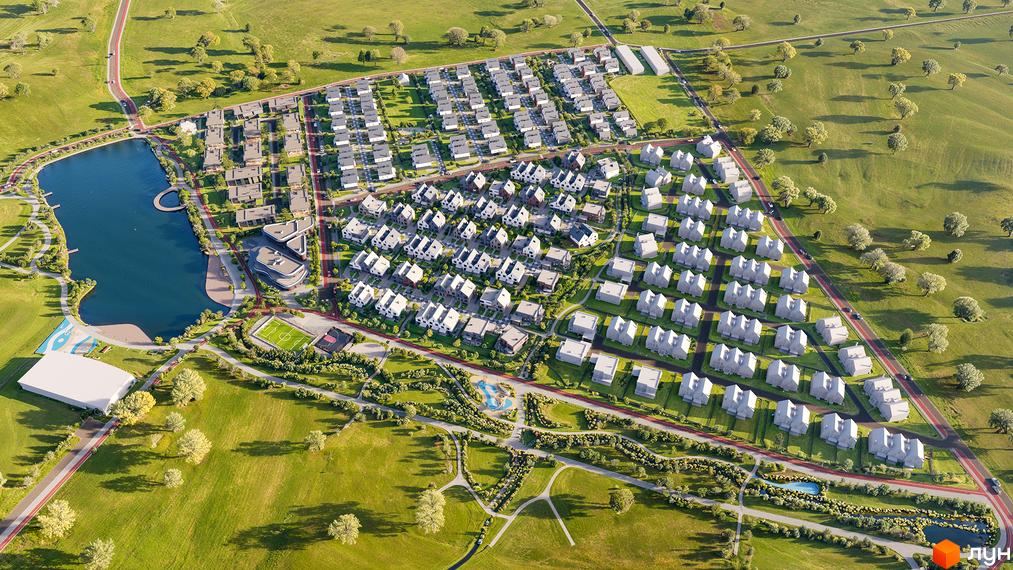 Панорамний вигляд Котеджного містечка LAGOM: акуратні будинки з білими дахами, зелені газони та доглянута прибудинкова територія з озером.