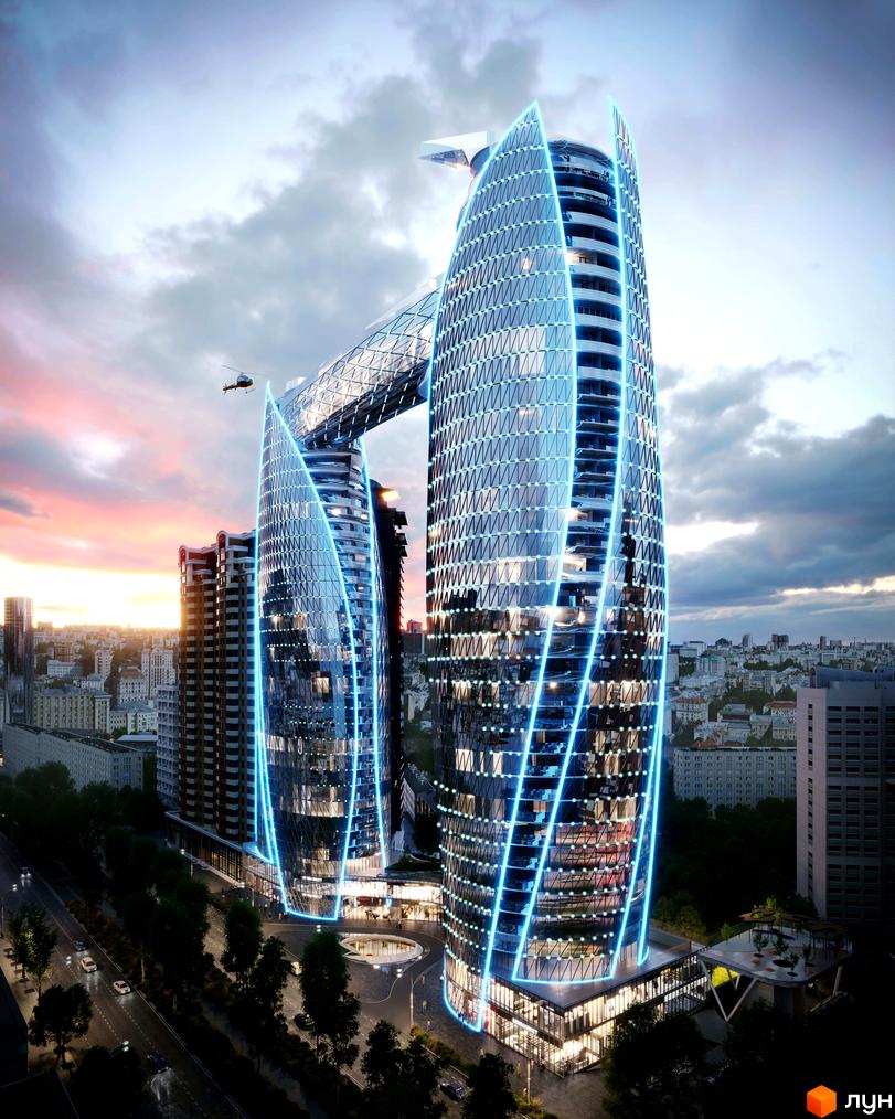 Зображення Житлового комплексу NVER з двома високими будівлями, з'єднаними переходом. Навколо комплексу розташована прибудинкова територія.