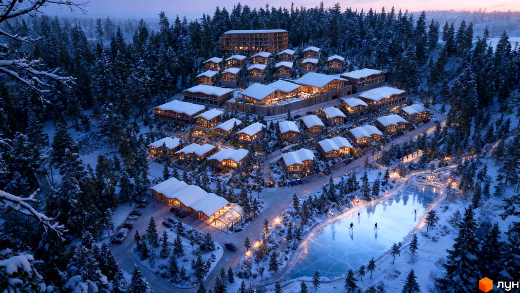 Зимовий вид на Chamonix Premier Resort з котеджами та озером для катання на ковзанах. Будинки з освітленням серед засніжених дерев.