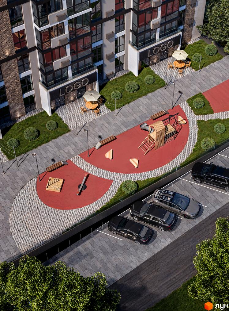 Вигляд зверху на Новобудову Shevchenko Hall з дитячим майданчиком та парковкою. Навколо будинку зелені насадження.