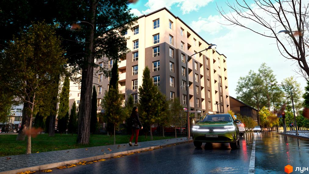 Зображення будинку Житлового комплексу Family Park з прилеглою територією. Вигляд з вулиці на зелений двір та фасад будинку.