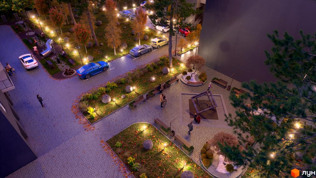Зображення двору Житлового комплексу Family Park з ландшафтним дизайном, освітленням та парковкою. Вигляд зверху на територію забудови.