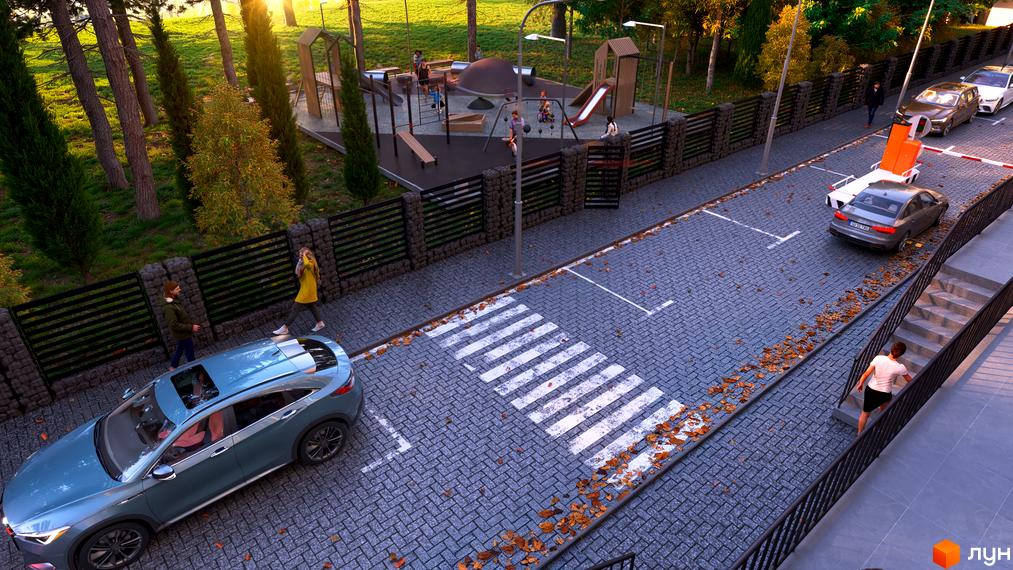 Зображення Житлового комплексу Family Park з виглядом на дитячий майданчик та парковку. На передньому плані видно автомобіль.