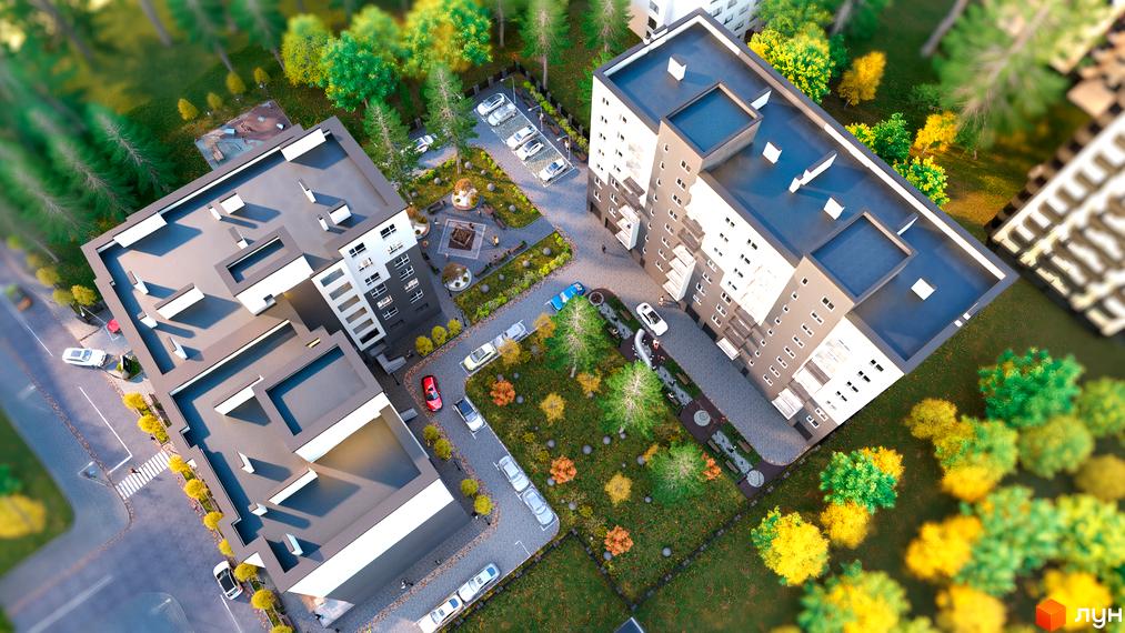 Вигляд зверху на Житловий комплекс Family Park з будинками та прибудинковою територією з паркінгом, дитячим майданчиком та зеленими насадженнями.