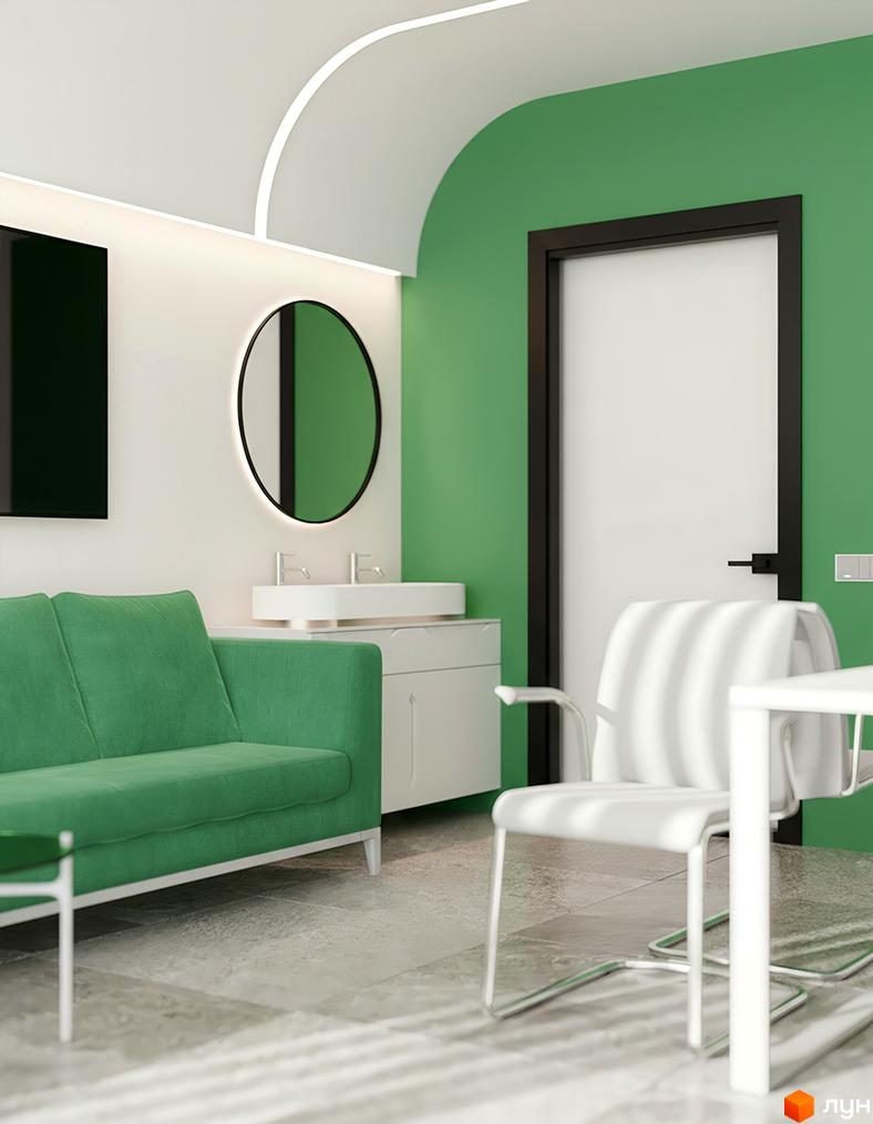 Інтер'єр кімнати в Житловому комплексі LELEKA by Odesa з зеленим диваном, білим кріслом та дзеркалом. Зелена стіна та білі меблі.