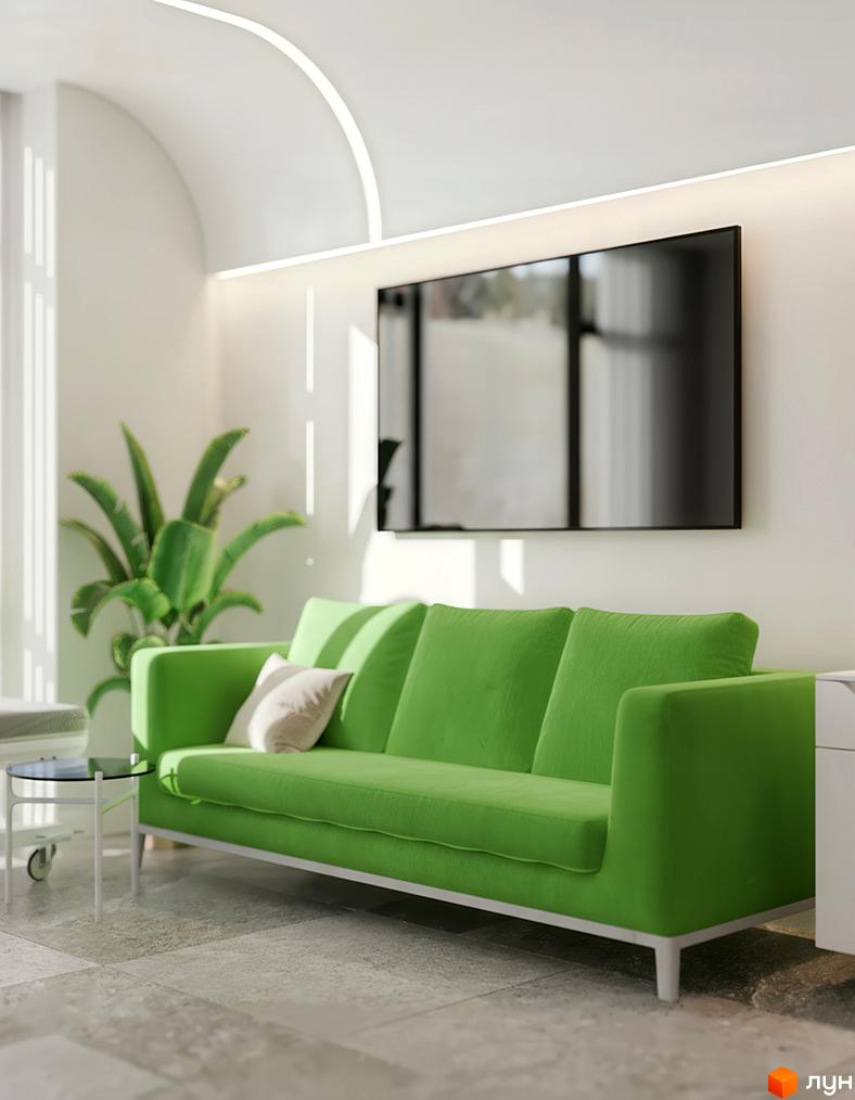 Інтер'єр кімнати з диваном та телевізором. Житловий комплекс LELEKA by Odesa з зеленим диваном на фоні білої стіни.