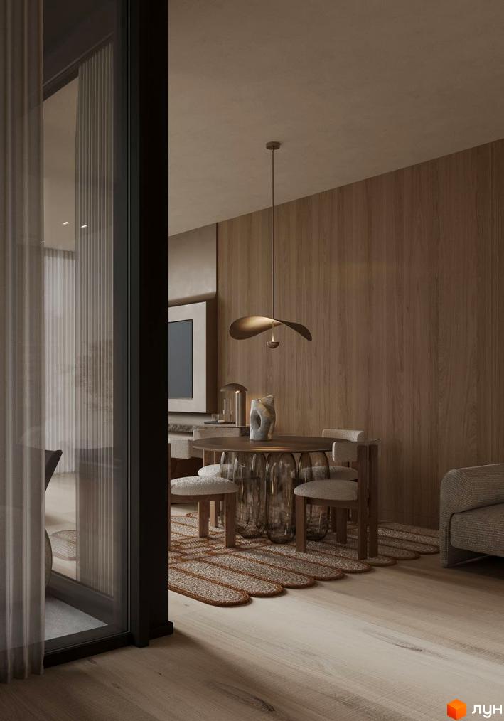 Інтер'єр кімнати в апарт-комплексі Crystal Hills: обідній стіл з оригінальними ніжками та стільці з м'якою оббивкою. На підлозі килим з візерунком.