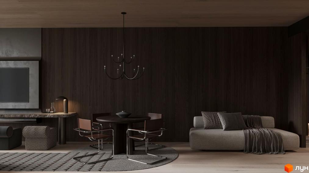 Інтер'єр кімнати з круглим столом та диваном. На стіні дерев'яні панелі, на підлозі килим.