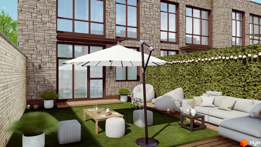 Зображення таунхаусів Garden City з великими вікнами та зеленим подвір'ям. На території розташовані меблі для відпочинку.