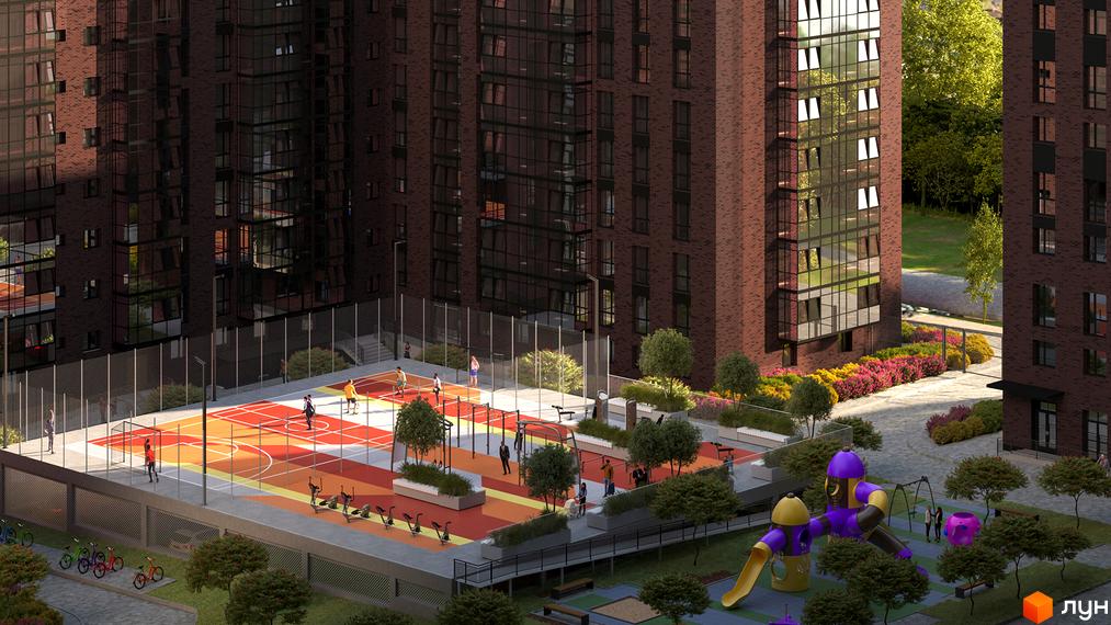 Зображення Житлового комплексу Стандарт з виглядом на баскетбольний майданчик та дитячий майданчик. Висотки з червоної цегли.