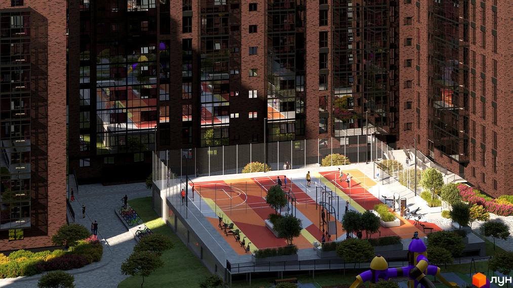 Зображення Житлового комплексу Стандарт з виглядом на дитячий майданчик та спортивну зону. Фасад будинку з червоної цегли.