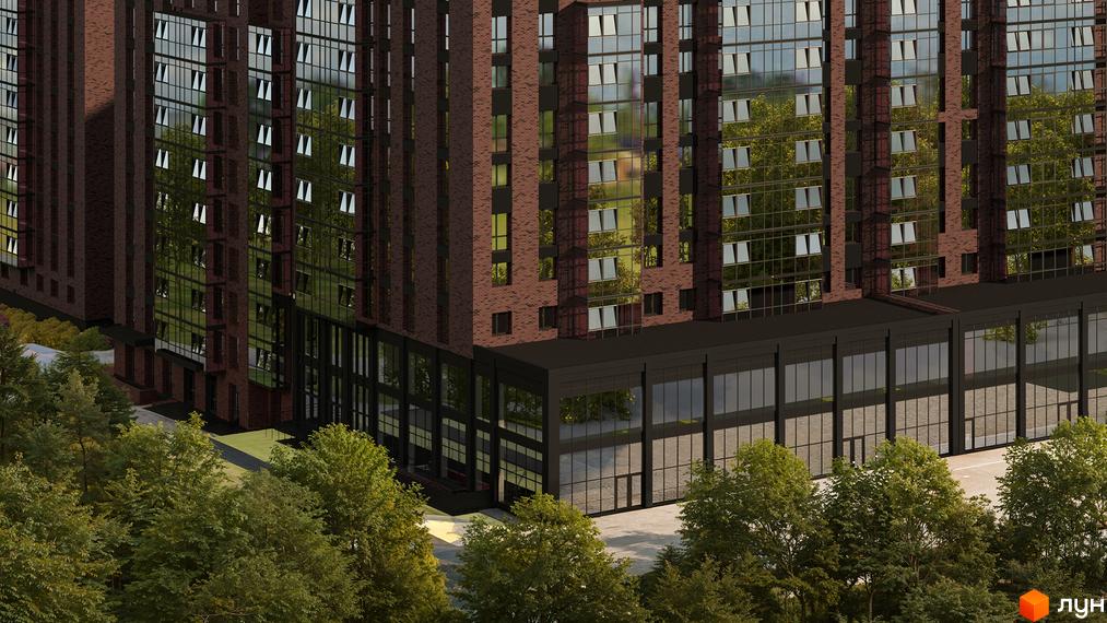 Зображення фасаду Новобудови Standard з великими вікнами та цегляним оздобленням. Навколо зелені дерева.