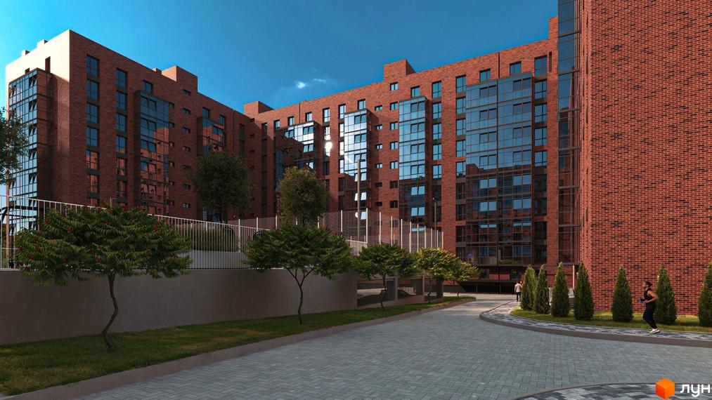 Зображення фасаду будинку з великими вікнами в Житловому комплексі Стандарт. На передньому плані пішохідна зона з тротуарною плиткою.