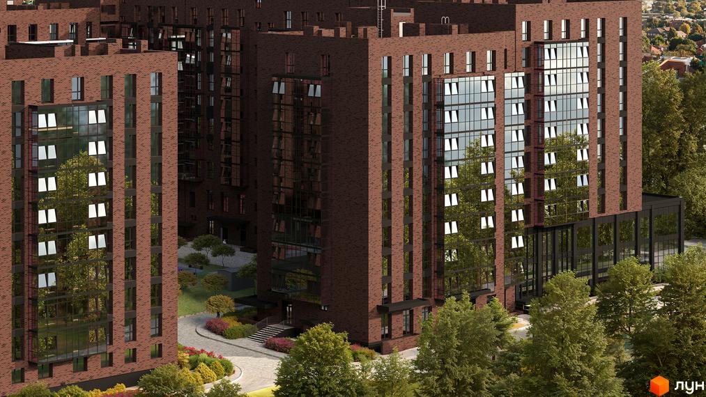 Зображення фасаду та прибудинкової території Житлового комплексу Standard. Цегляна багатоповерхівка з великими вікнами та зеленими насадженнями.