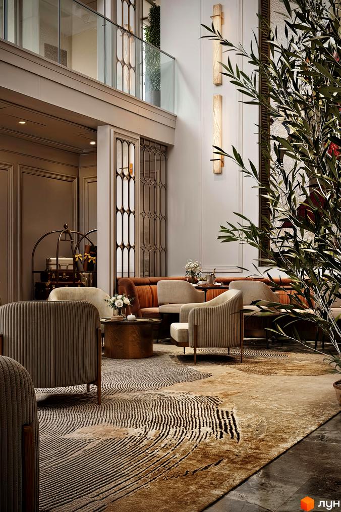 Інтер'єр лобі з м'якими меблями у Житловому комплексі MIY by Five Forces. Зона відпочинку з кріслами та столиком на килимі з візерунком.