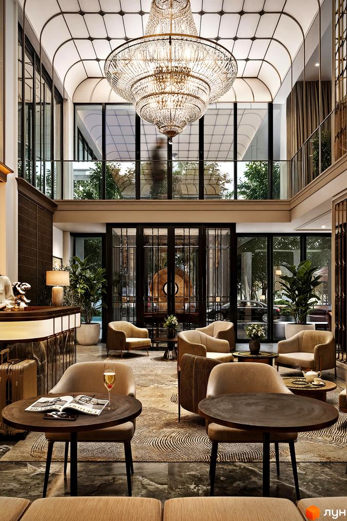 Інтер'єр лобі з люстрою в Будівельному проєкті MIY by Five Forces. Зона відпочинку з кріслами та столиками для мешканців.