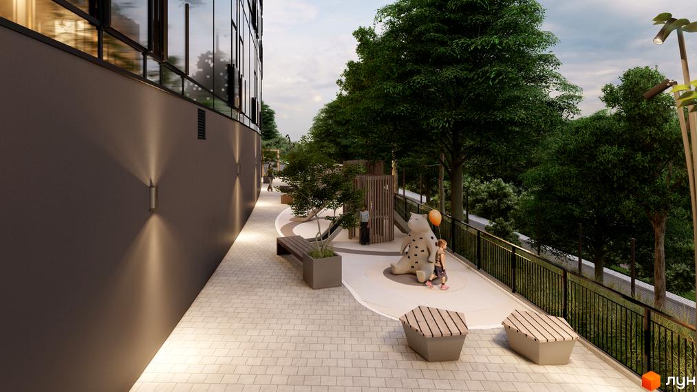 Emily Apartments: фасад будинку з панорамними вікнами та освітленням, поруч дитячий майданчик з ігровими елементами та зона відпочинку.