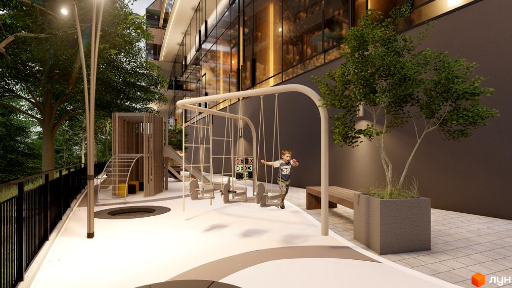 Дитячий майданчик біля новобудови ЖК Emily Apartments з гойдалками, гірками та батутом. Сучасна архітектура будівлі та зелена прибудинкова територія.