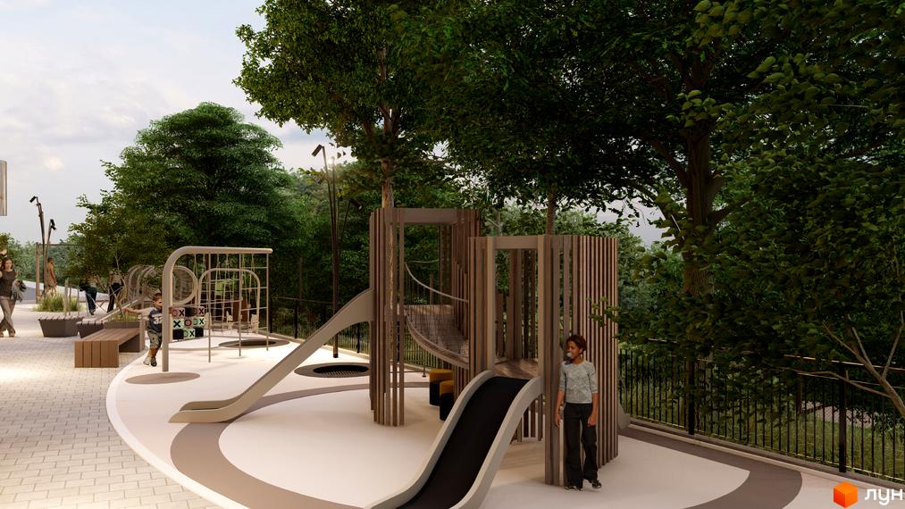 Дитячий майданчик у ЖК Emily Apartments з гірками та ігровими елементами, оточений деревами. Сучасна зона відпочинку для дітей та дорослих.