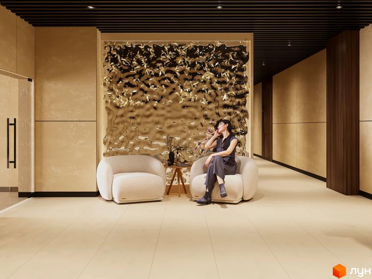 Житловий комплекс Emily Apartments: елегантний хол з дизайнерським декором та комфортними кріслами. Сучасний дизайн інтер'єру новобудови.