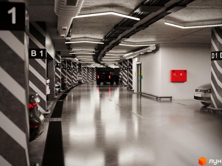 Підземний паркінг ЖК Emily Apartments з позначками місць та автомобілями. Паркінг має бетонну стелю та стіни, освітлення та пожежний щиток.