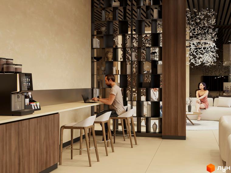 Житловий комплекс Emily Apartments: зона відпочинку з кавомашиною та барною стійкою, де чоловік працює за ноутбуком, та зона відпочинку з диванами, де сидить жінка.