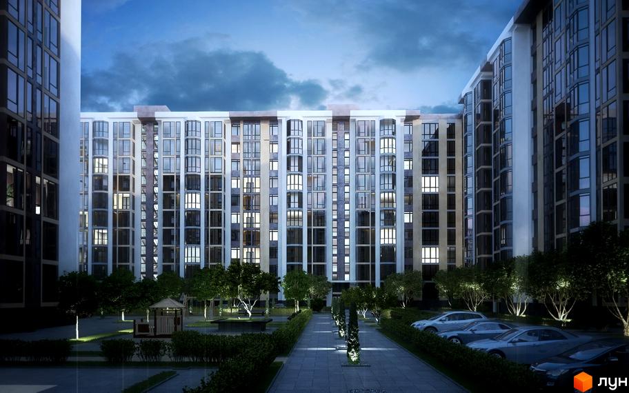 Житловий комплекс Софіївська сфера. Високі будинки з великою кількістю вікон, вхідні групи. Доглянута прибудинкова територія з алеями, деревами та місцями для паркування.