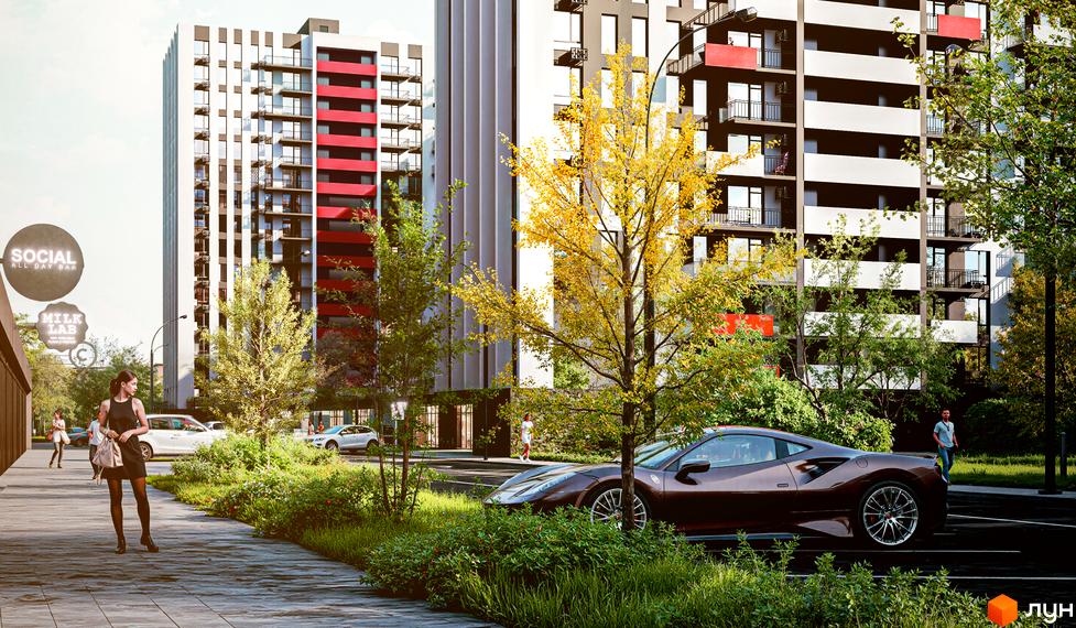 Житловий комплекс Family Plaza 2: сучасні будинки з червоними та білими фасадами, балконами та панорамними вікнами, поруч зелена зона з деревами та припаркованими автомобілями.
