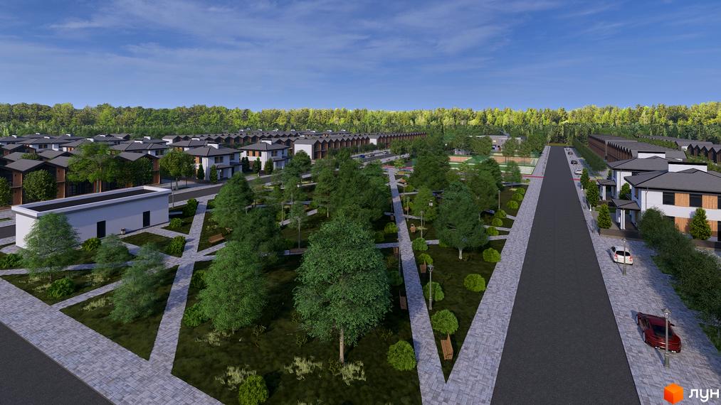 Котеджне містечко КМ Beverly Hills Town з акуратними будинками та доглянутою прибудинковою територією з деревами та доріжками.