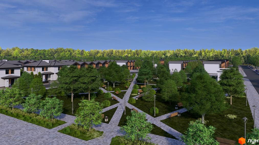 Зовнішній вигляд будинків котеджного містечка КМ Beverly Hills Town з парковою зоною та алеями. Новобудова з зеленими насадженнями та місцями для відпочинку.