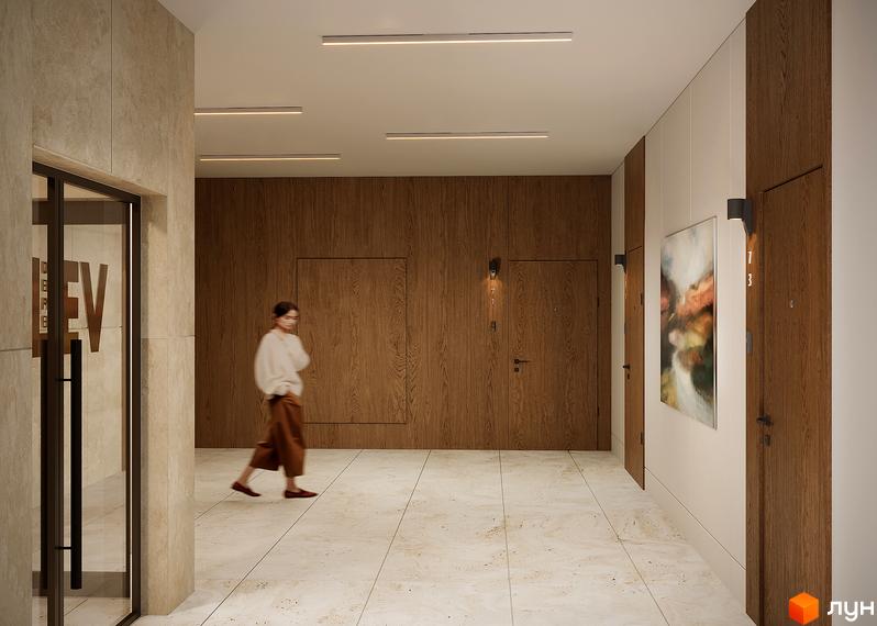 Дизайн холу новобудови ЖК SOUL PARK з дерев'яними панелями та дверима. Сучасне освітлення та абстрактний живопис додають елегантності простору.