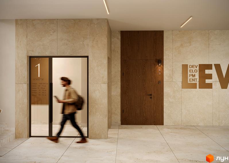 Вхідна група житлового комплексу SOUL PARK з дверима та ліфтом. Зовнішній вигляд новобудови з оздобленням стін та підлоги.
