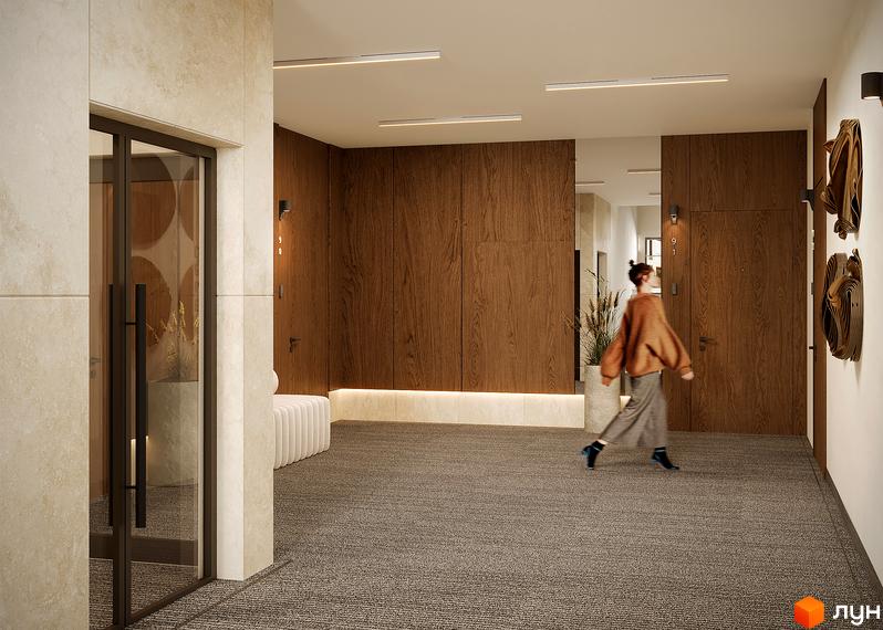 Вхідна група в житловий комплекс SOUL PARK з дерев'яними панелями та килимовим покриттям. Дизайн інтер'єру лобі новобудови.